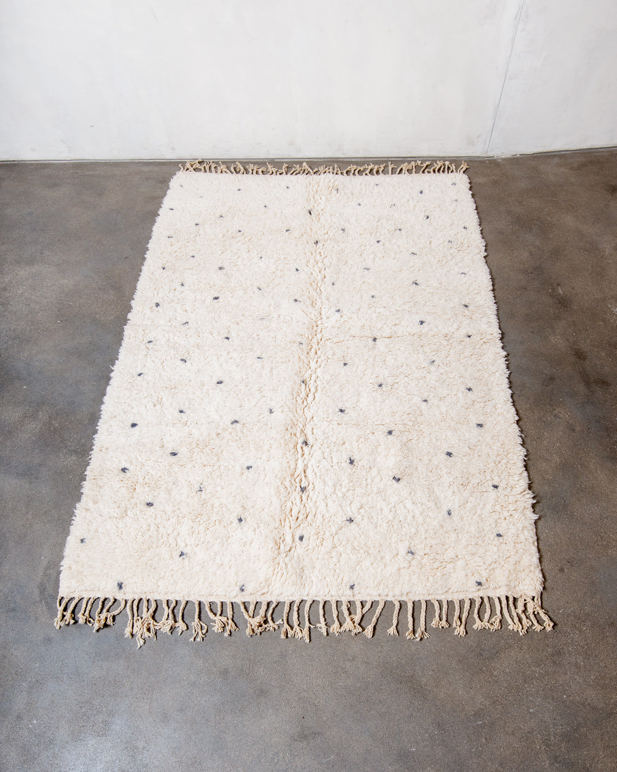 Modern, designer, handcrafted Berber rug from Morocco. Beniourain carpet with beautiful colours and patterns and fluffy wool texture.